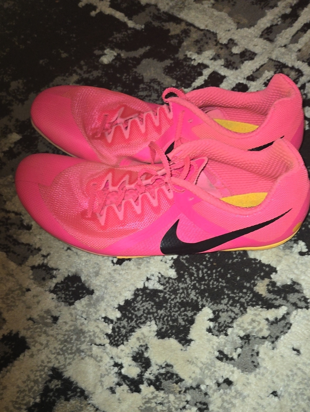Nike Hot Pink Athletic Running Shoes with Black Swoosh spikes